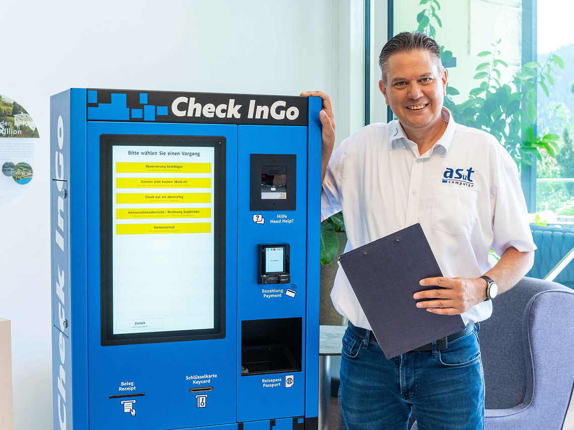 Hotel self-service check-in kiosk with Beetronics touchscreen, enabling automated guest check-in, payment and key card issuance.
